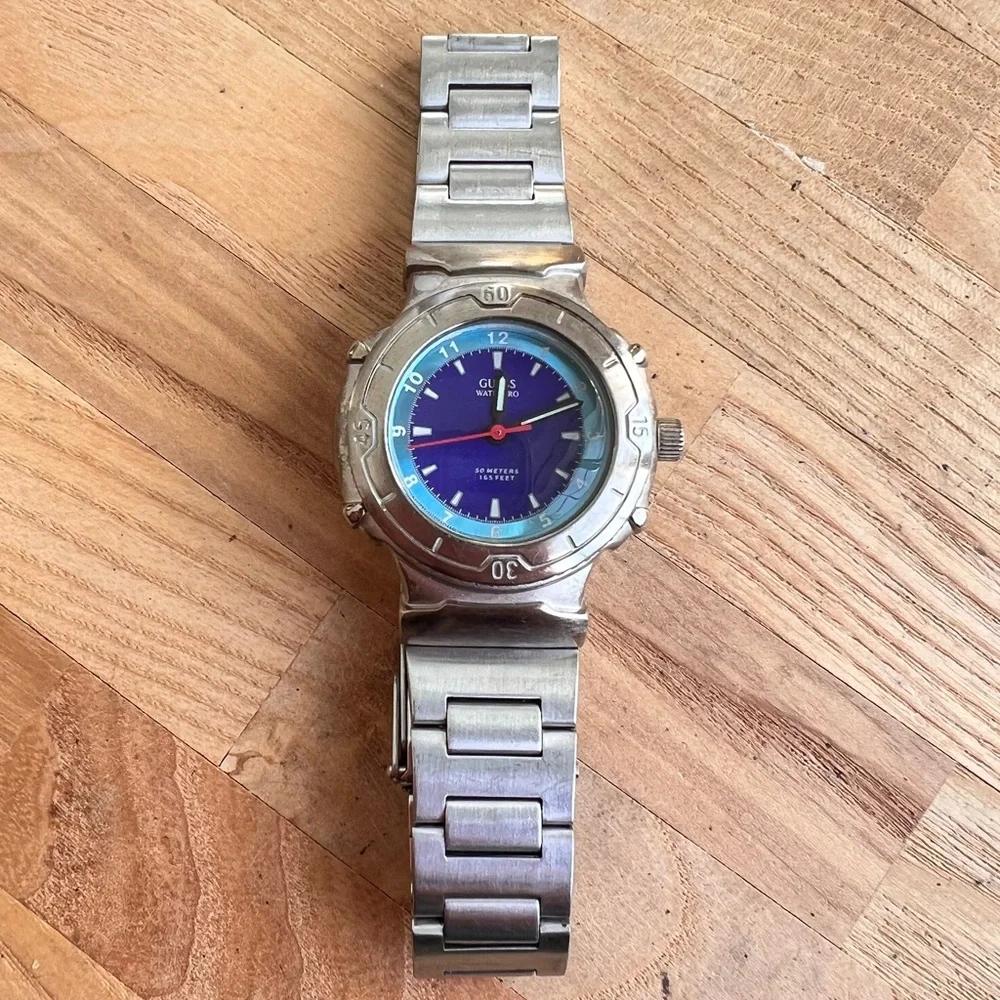 Guess ladies waterpro blue dial silver tone sport watch NEW BATTERY
